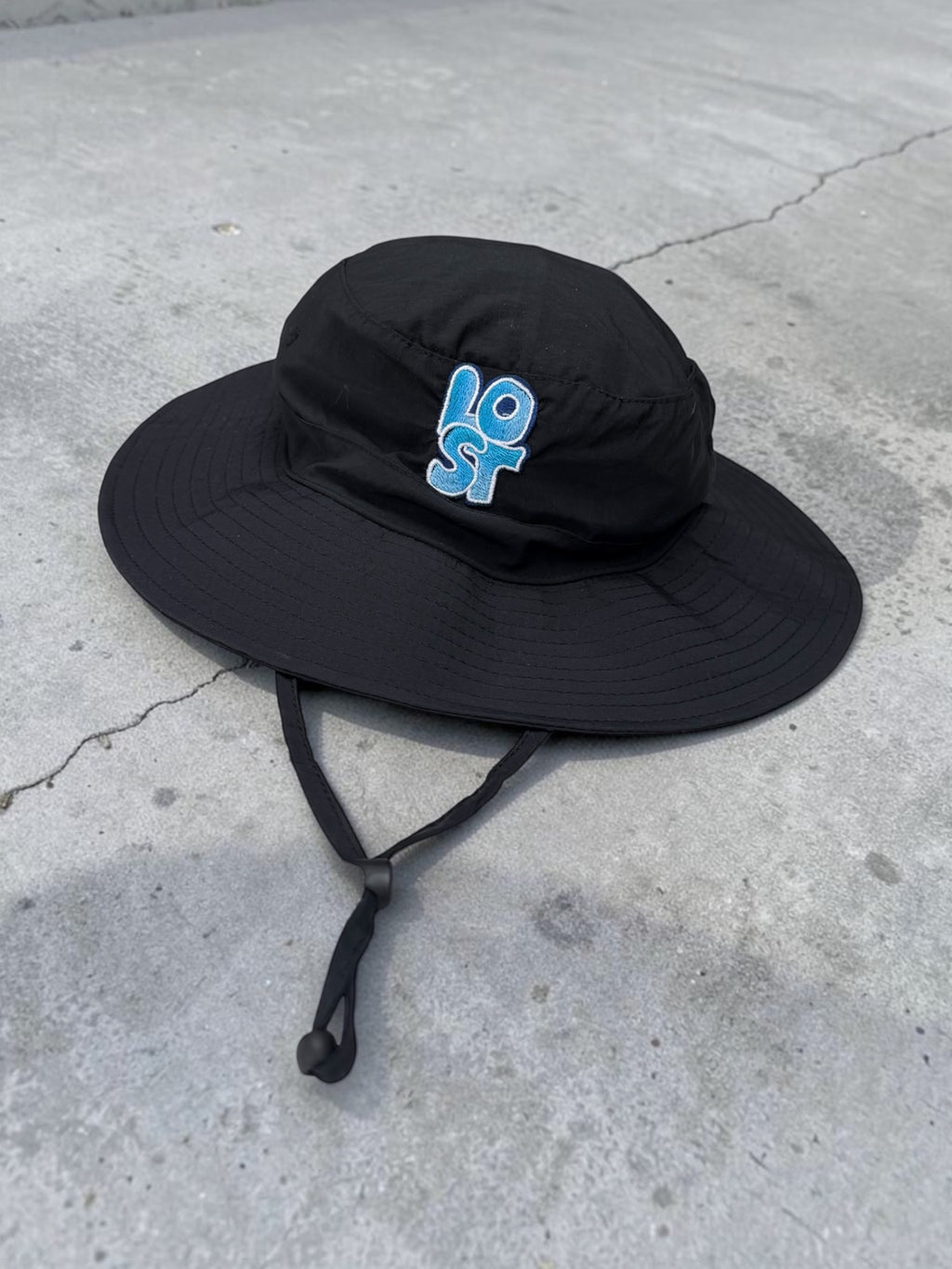 Black feetival bucket hat